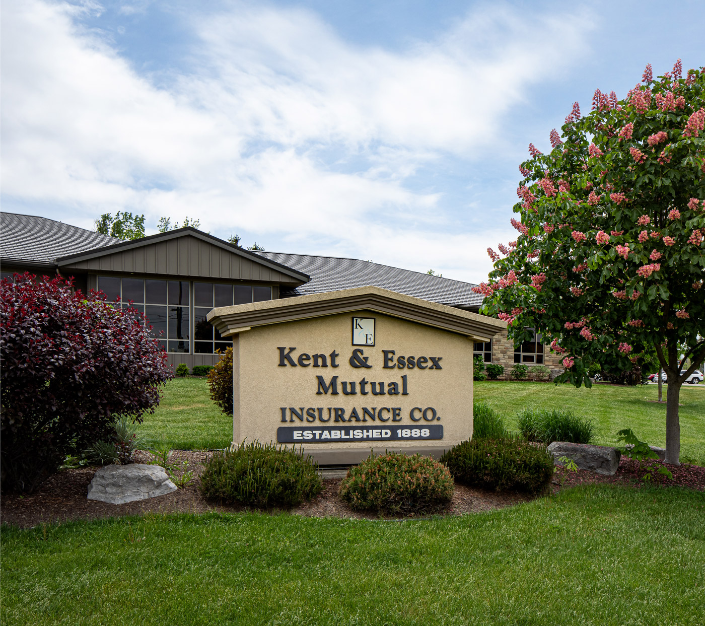 Photo of the sign out front of the Kent and Essex office building